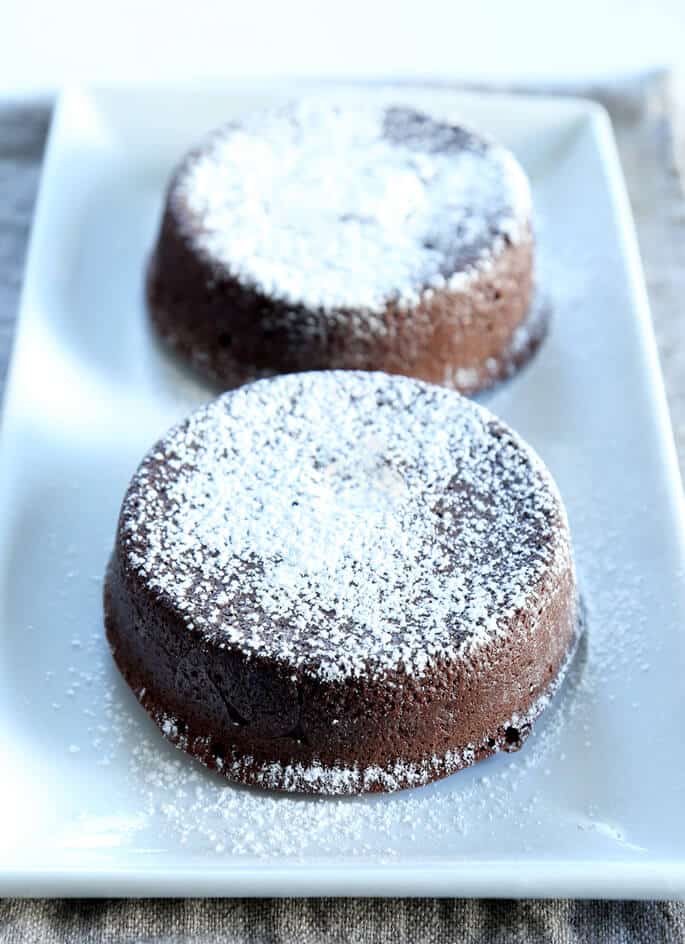 Restaurant-style gluten free chocolate lava cakes with a warm, gooey center. For your Valentine, or any time!