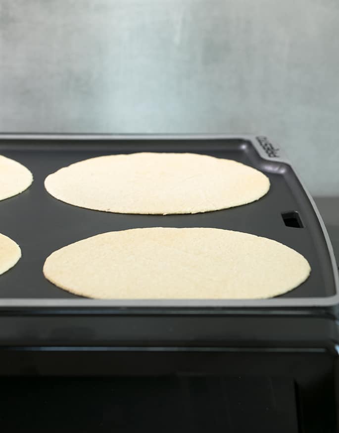 These low carb tortillas are made with a blend of almond flour and coconut flour, and the dough is amazingly easy to handle. With less than 2 net carbs per tortilla, they're going to be your new favorite gluten free tortilla!