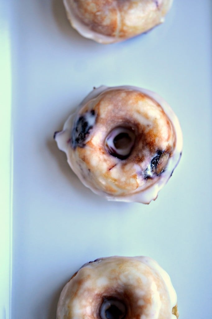 A close up of a doughnut on white surface 