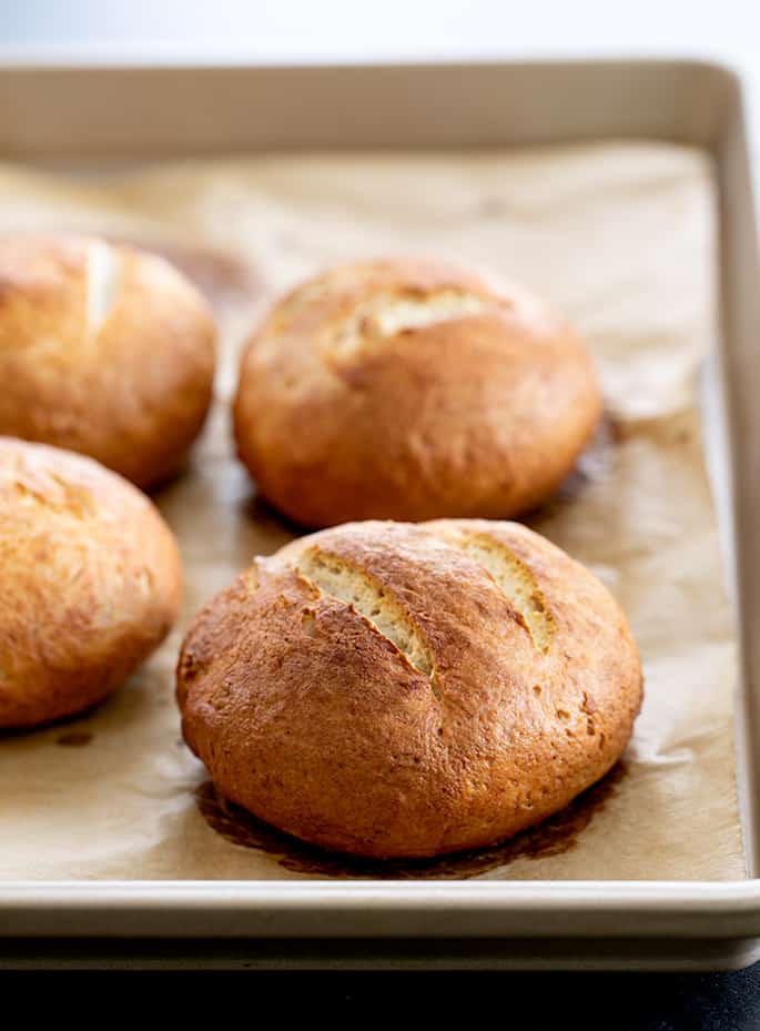 Pretzel rolls baked on tray