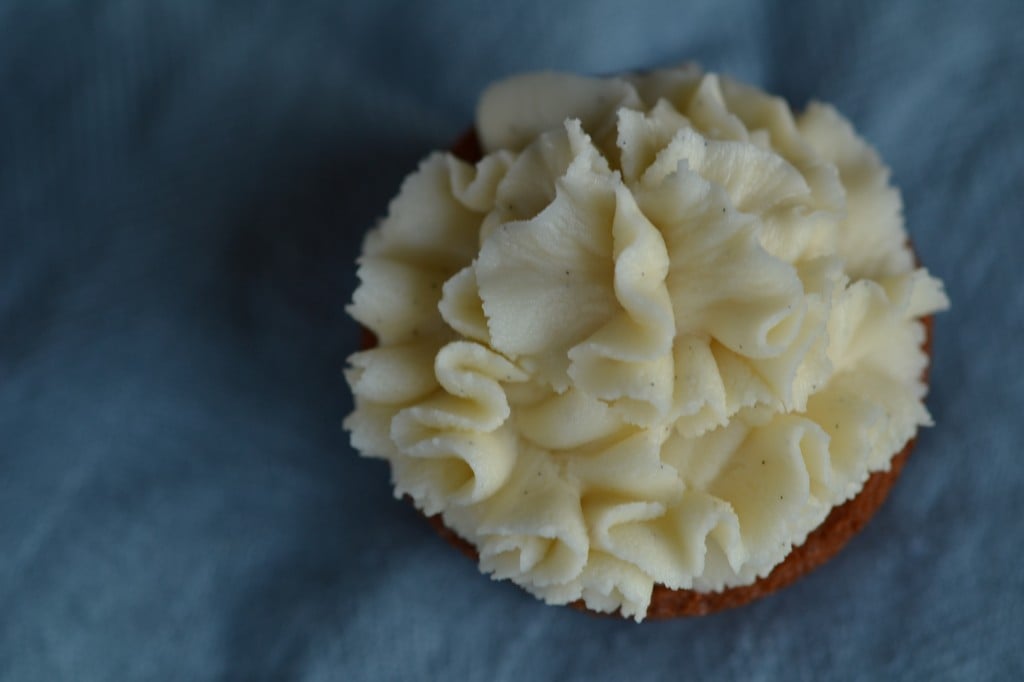 Overhead view of Cupcake with white chocolate frosting 