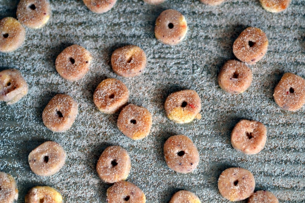 Apple jack style cereal on gray surface