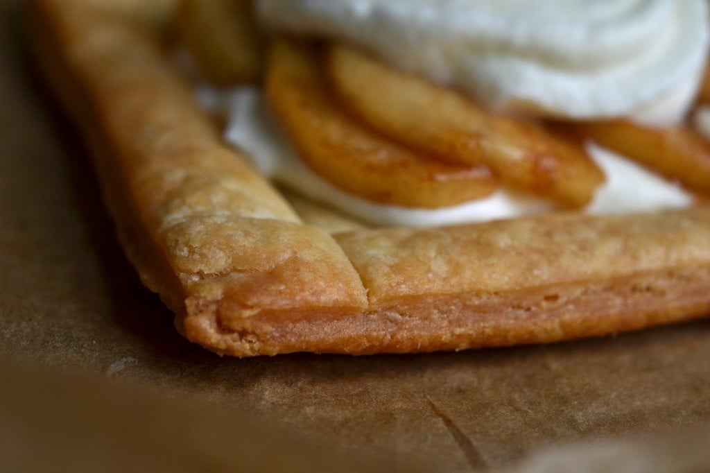 A close up side view of baked gluten free puff pastry