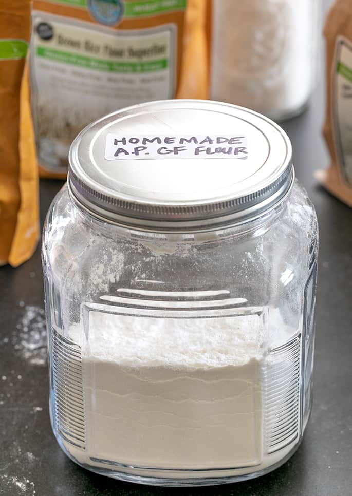 A jar of homemade gluten free flour with the lid on