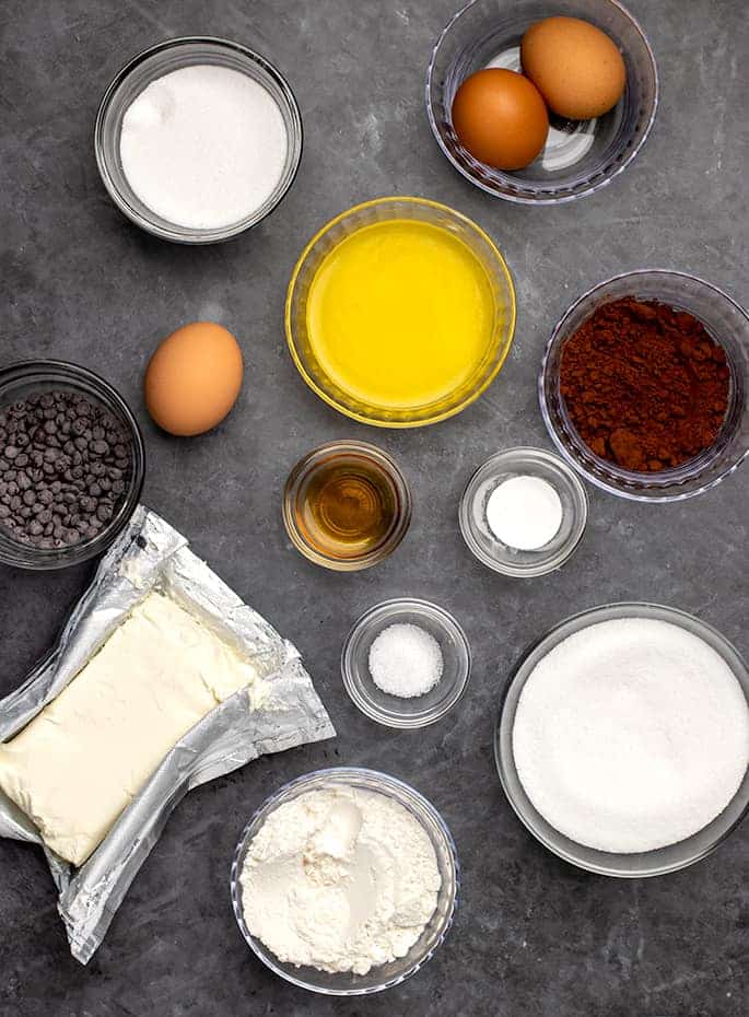 Overhead image of ingredients for brownie and cheesecake batters