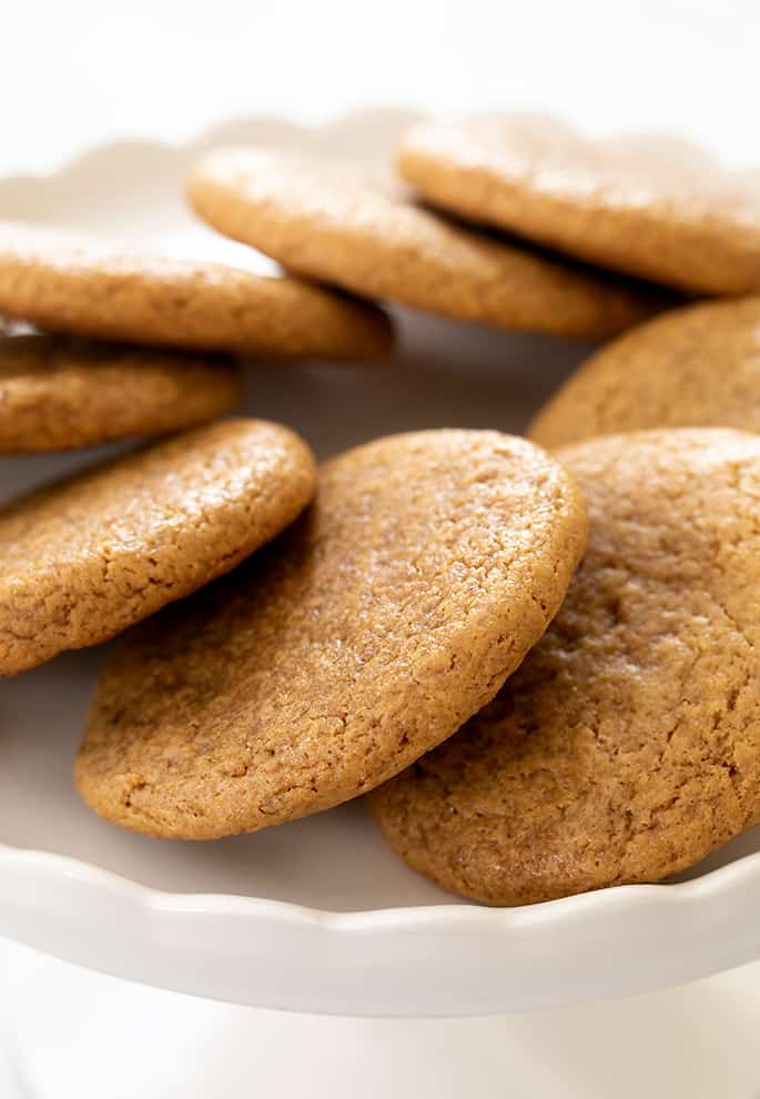 Molasses cookies arranged on cake plate