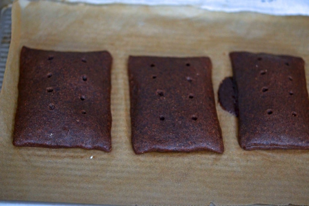 chocolate pop tarts on beige surface