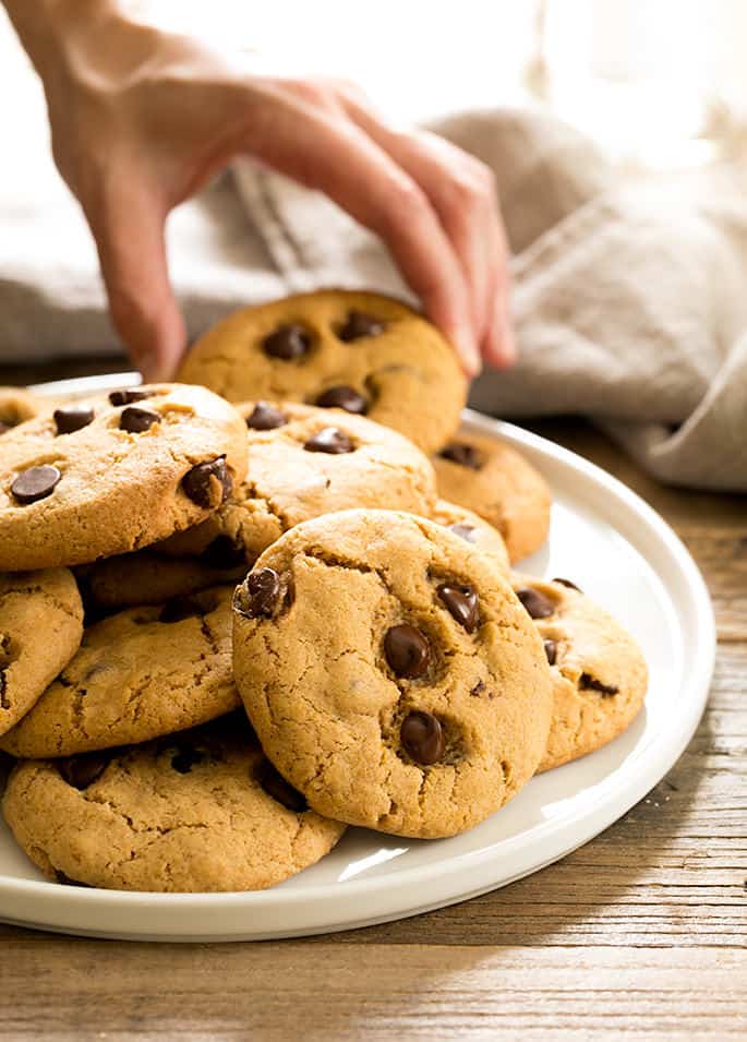 Traditional gluten free chocolate chip cookies get an upgrade with this recipe for bakery-style pumpkin chocolate chip cookies. Packed with fall flavors!