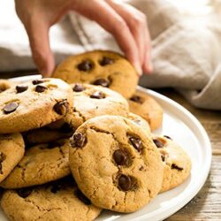 Traditional gluten free chocolate chip cookies get an upgrade with this recipe for bakery-style pumpkin chocolate chip cookies. Packed with fall flavors!