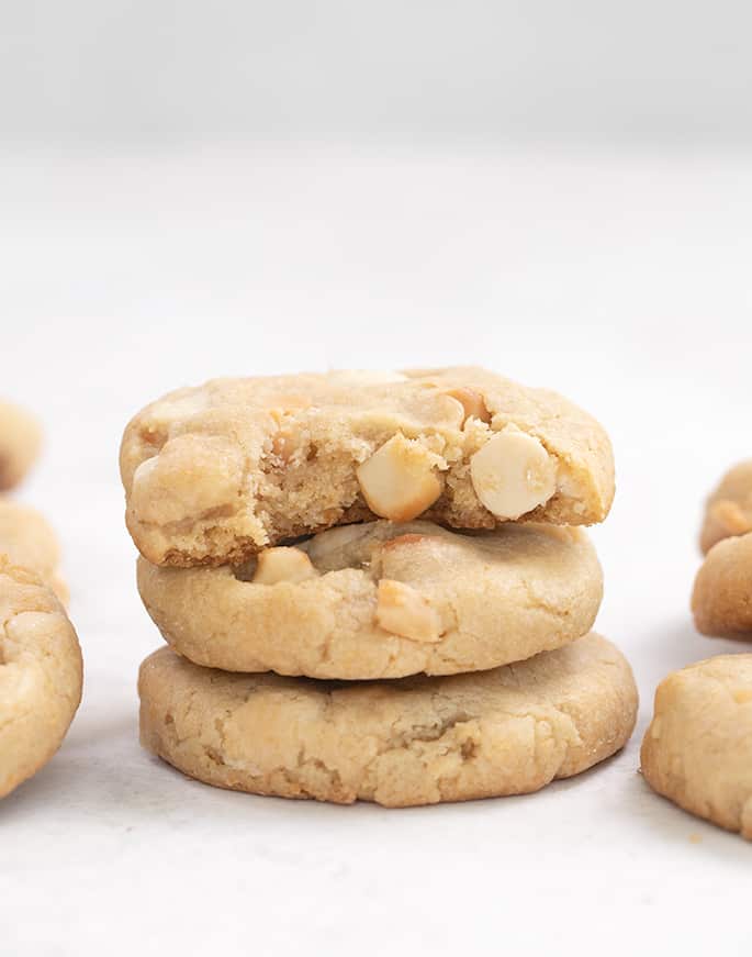 Stack of 3 white chocolate macadamia nut cookies