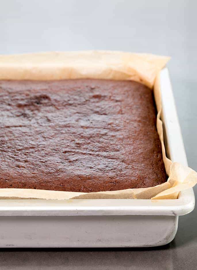 Rich chocolate and warm spices earn this moist and flavorful chocolate gluten free gingerbread cake a place of honor at your holiday table.