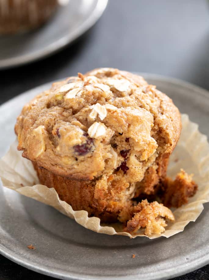 Lightly sweet gluten free morning glory muffins are packed with carrots, apples, coconut, and dried fruit. A super satisfying, healthy breakfast.