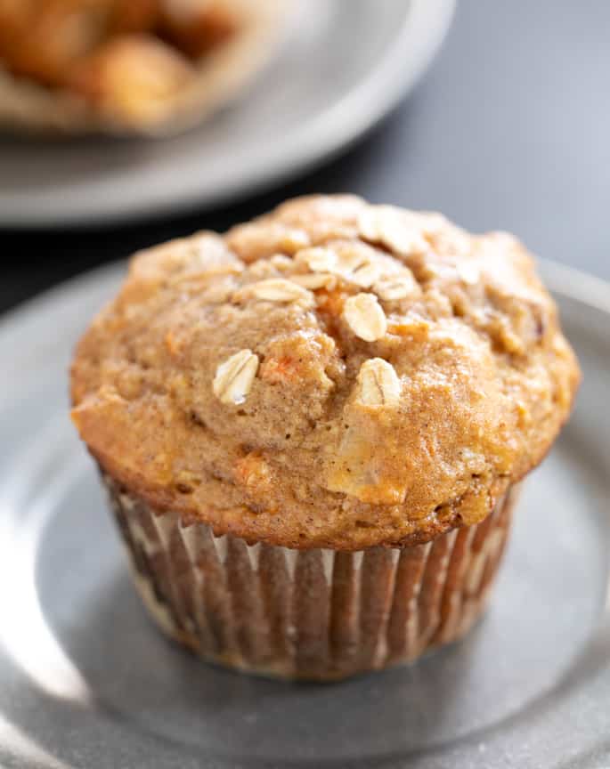 Lightly sweet gluten free morning glory muffins are packed with carrots, apples, coconut, and dried fruit. A super satisfying, healthy breakfast.