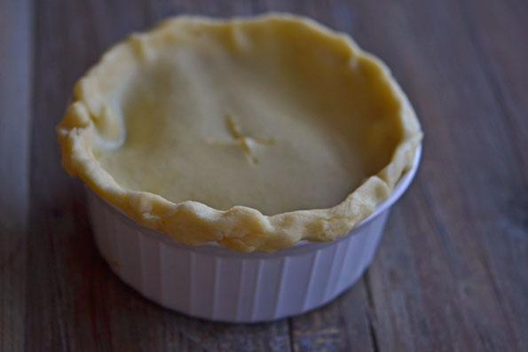 A close up of pie in a white dish