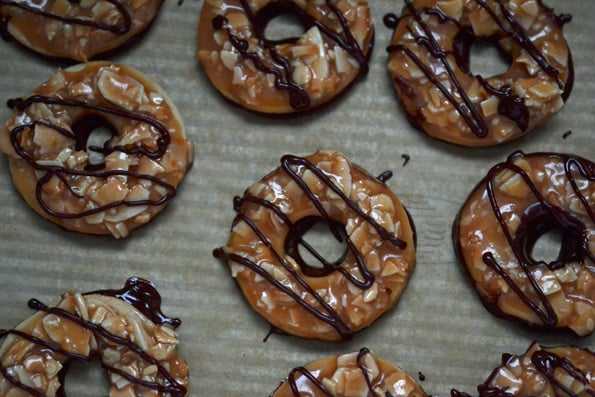 Samoas Girl Scout Cookies coated in chocolate drip