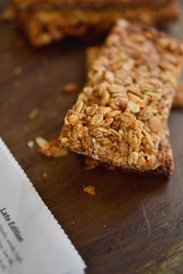 A close up of granola bar on wooden surface