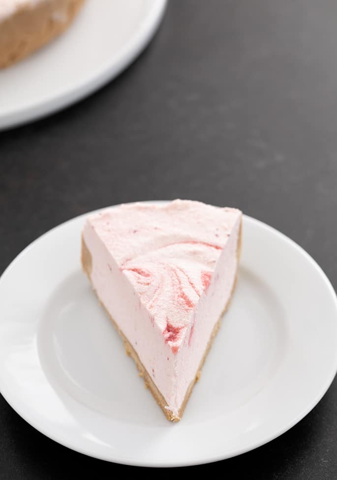 Strawberry yogurt pie slice on a plate