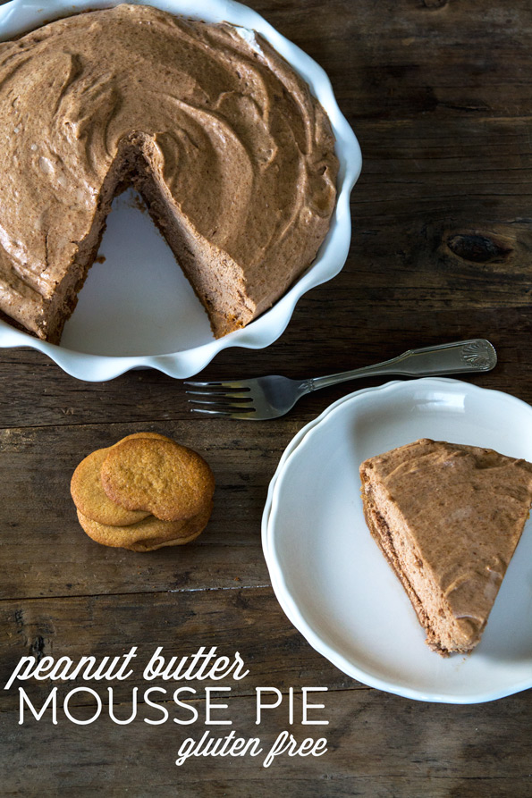 Overhead view of a piece of peanut butter mousse pie on a white plate