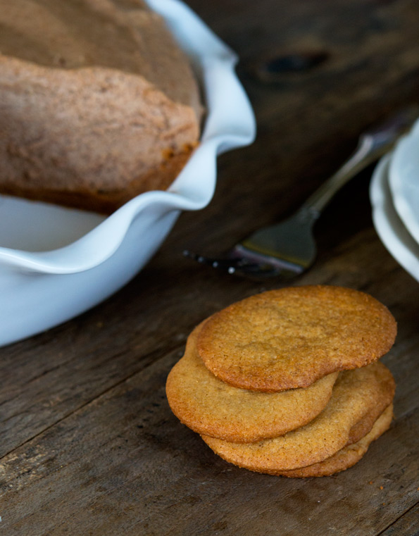 A close up of a stack of cookies on a wooden surface 