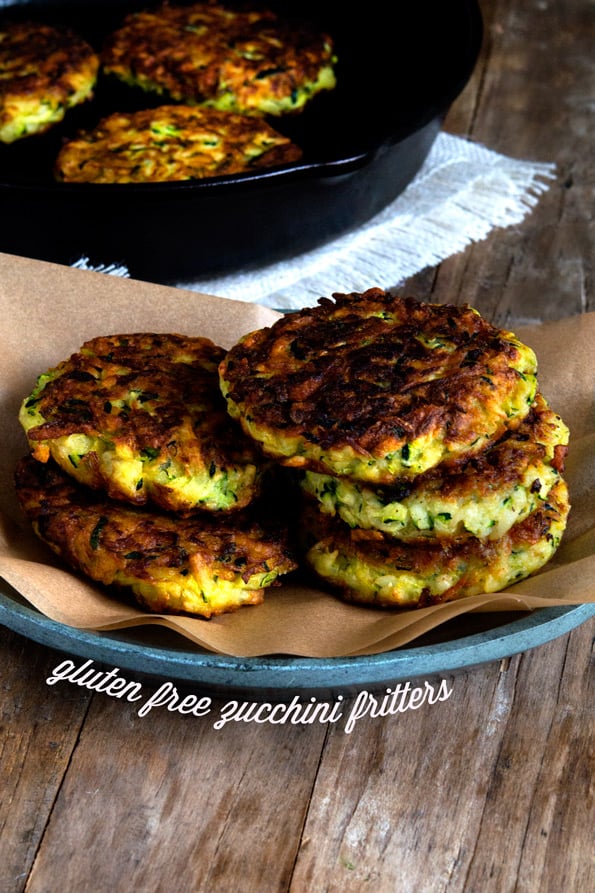 2 stacks of zucchini fritters on brown surface