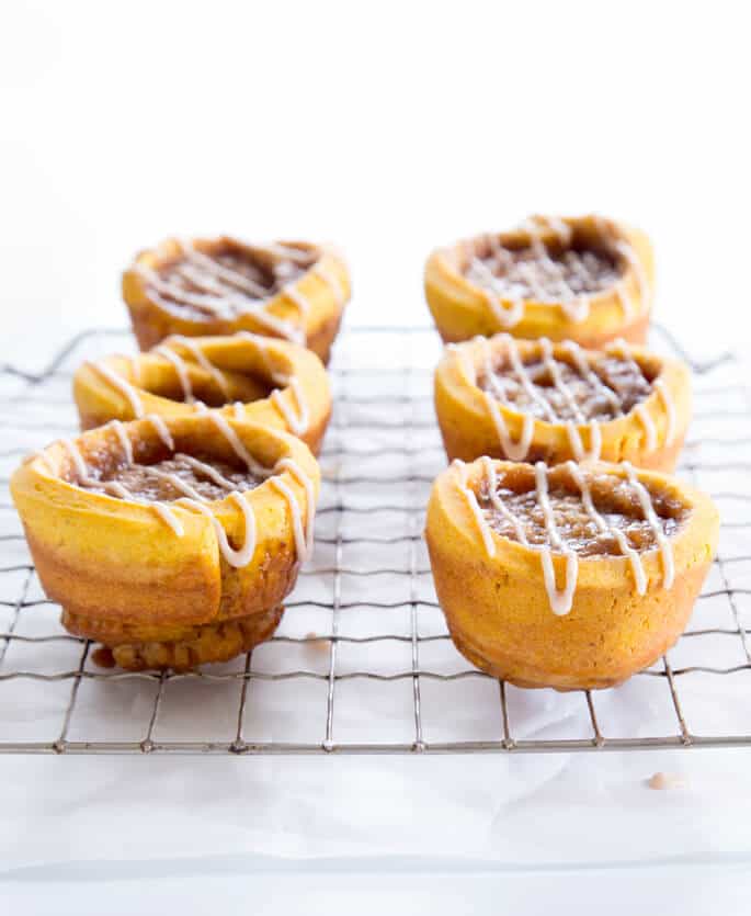 A metal tray of pumpkin cinnamon rolls 