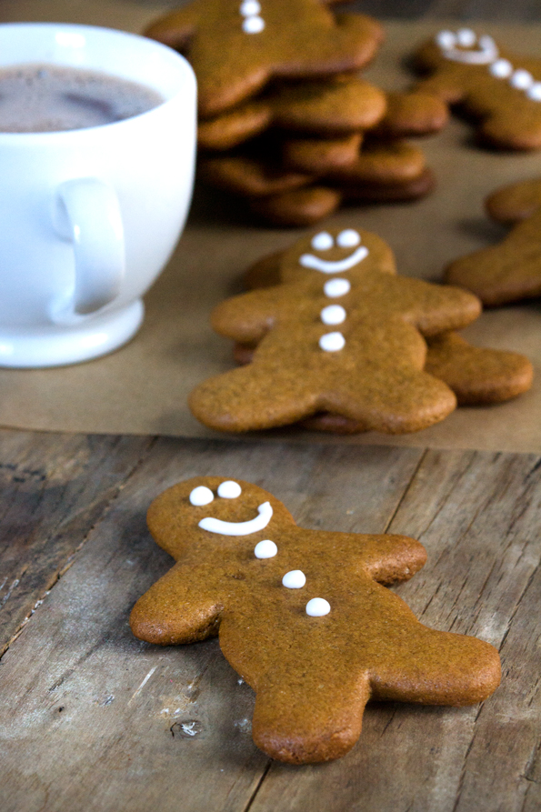 gingerbread men on wooden surface