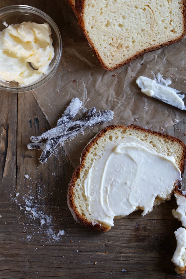 Overhead view of vanilla swirl bread on brown surface 