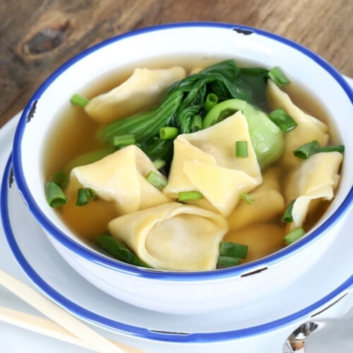 gluten free wonton wrappers made into wontons in soup in white bowl