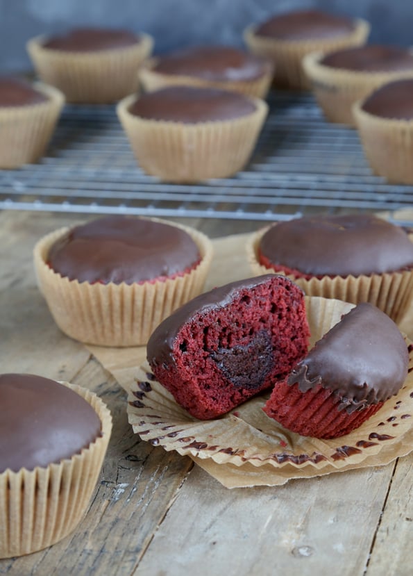 A close up of the inside of a red velvet cupcake 