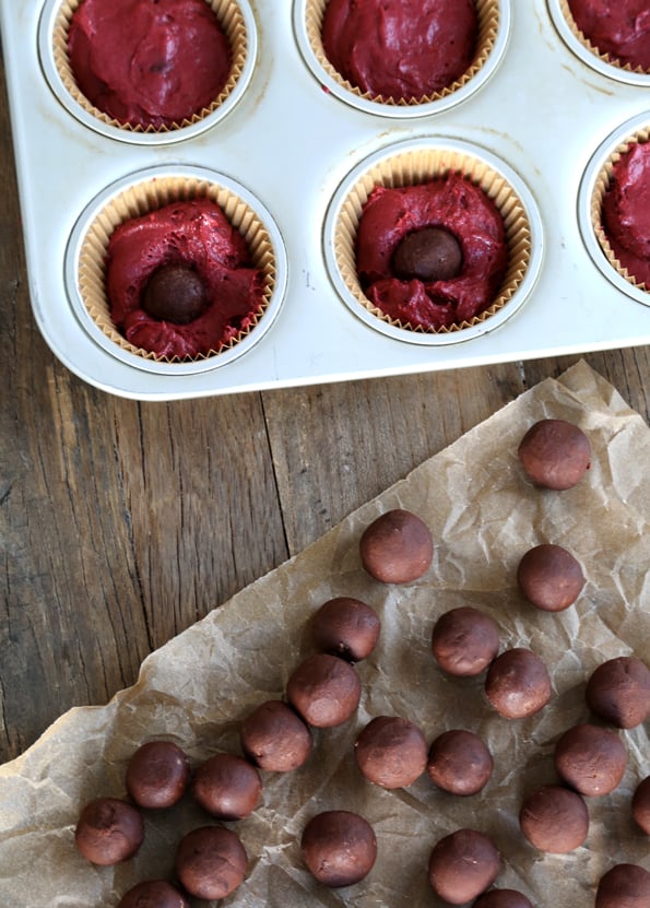 red gekeft cupcake batter in muffin tray