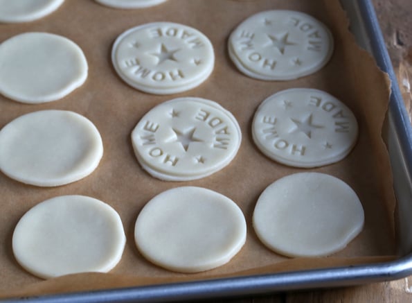 Shaped cookie dough on brown surface 