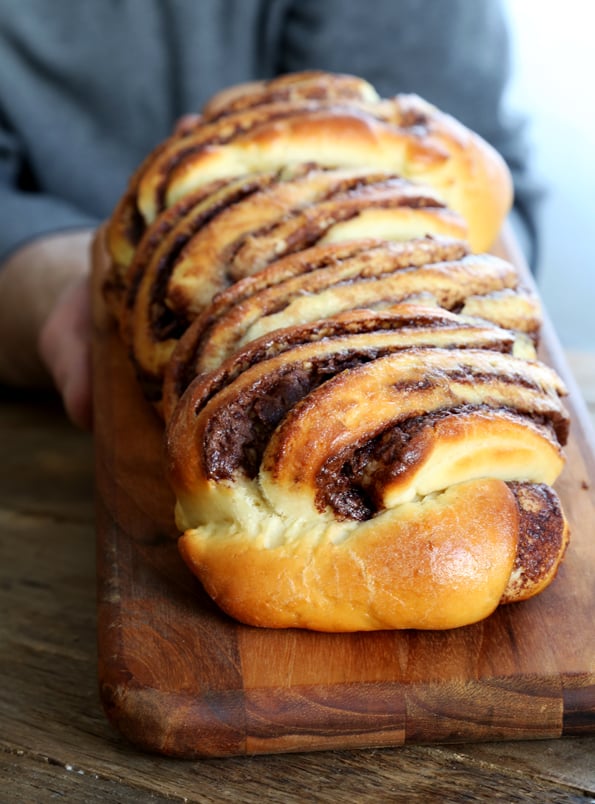 Nutella bread on wooden surface 