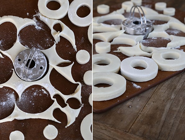 Raw donuts on wooden surface 