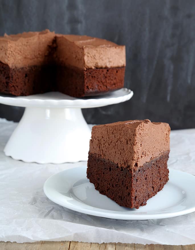 This gluten free chocolate mousse cake is the perfect moist, rich chocolate cake topped with light, eggless chocolate mousse. A showstopper!