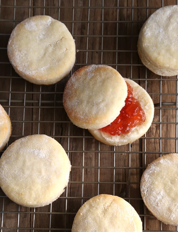 Gluten free angel biscuits image from above, one biscuit with jam.