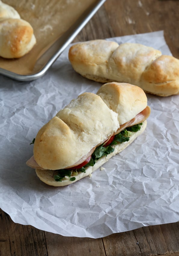 Overhead view of sandwich on a white surface 