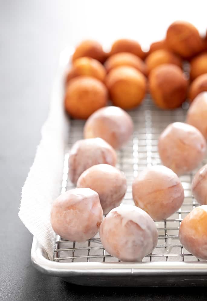 Donut holes glazed and unglazed on a tray