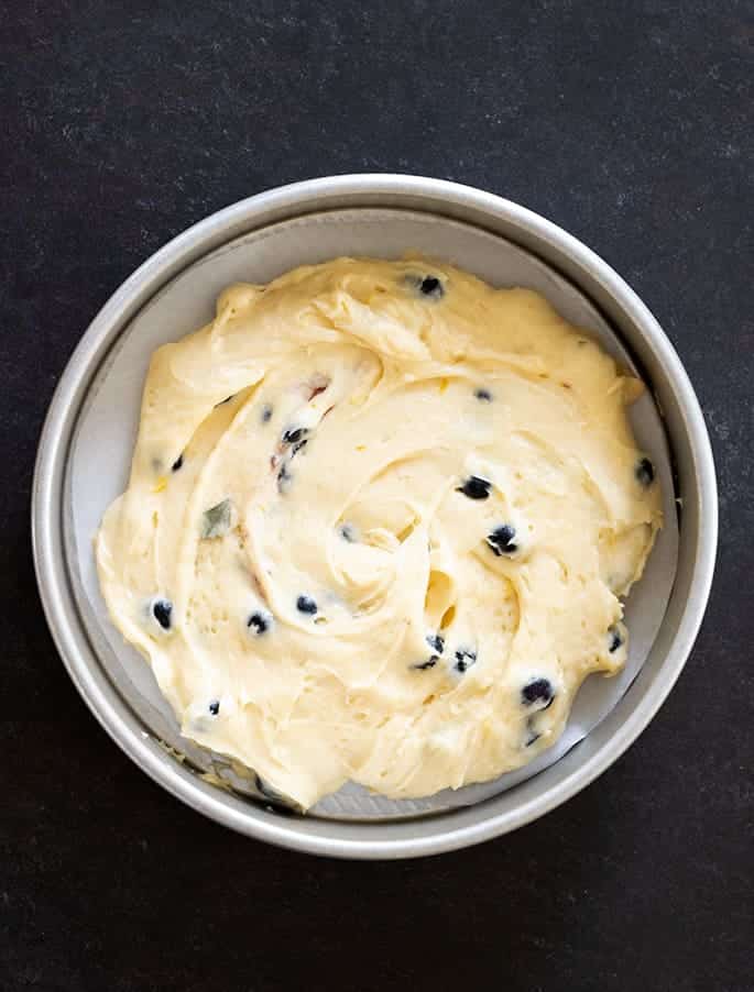 Gluten free lemon blueberry cake raw in pan