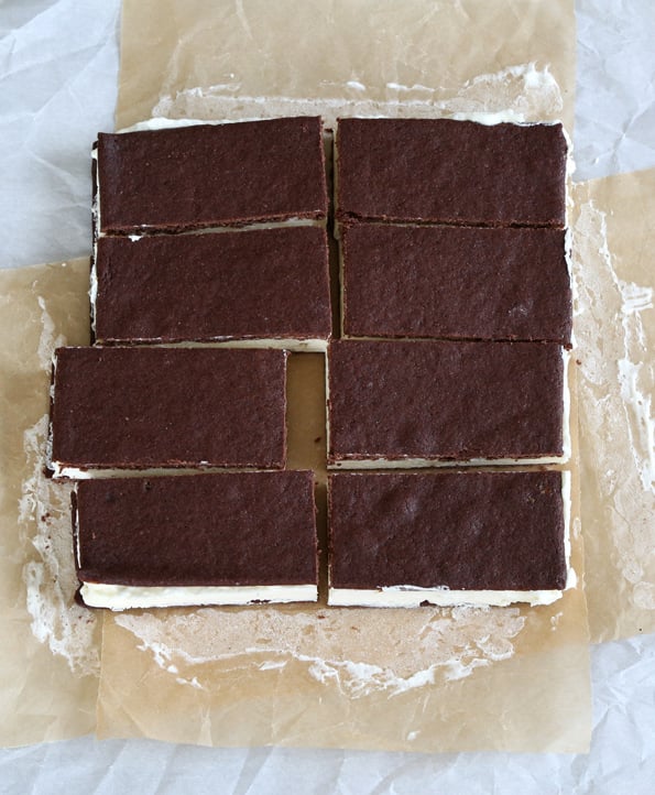 Overhead view of ice cream sandwiches in brown surface