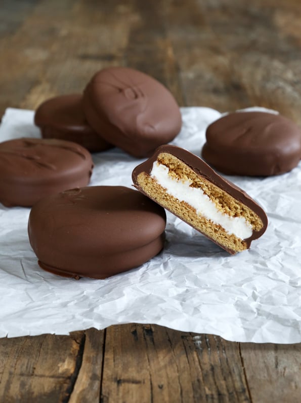 Moon pies with chocolate on top on white surface 