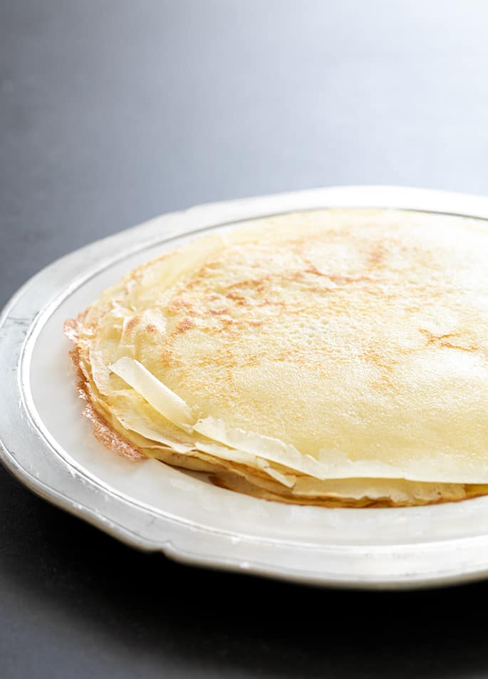 Gluten free crepes on plate in stack