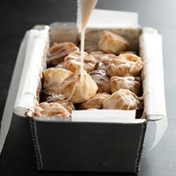 This recipe for gluten free monkey bread is easy to make, especially for the little hands of little kitchen helpers, and makes the house smell like warm, cinnamon goodness!