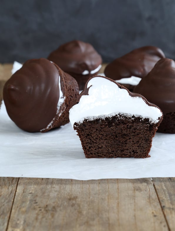 A close up of inside chocolate cupcake on white surface 