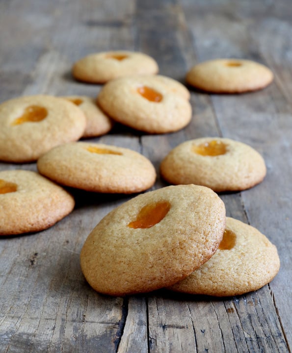 Peanut Butter & Jelly Cookies on wooden surface 