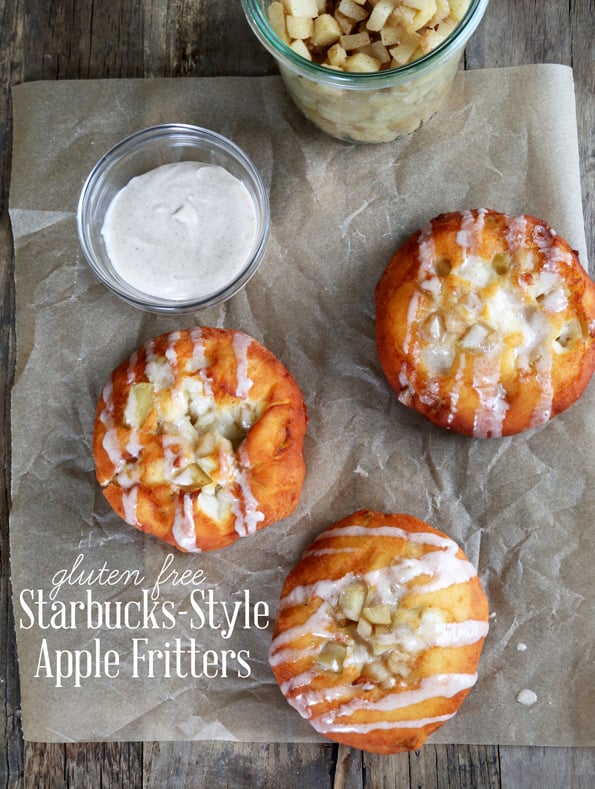 Overhead view of apple fritters on brown surface 