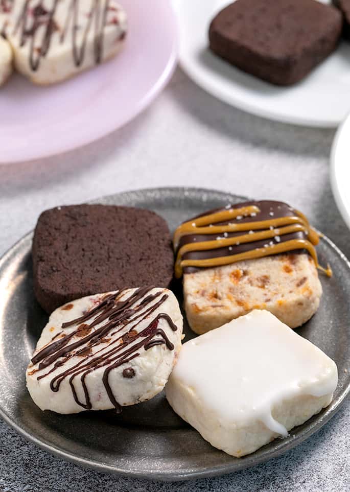 4 flavors of basic Shortbread cookies on small plate