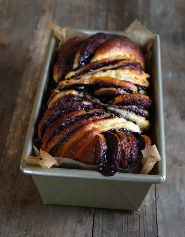 A close up of chocolate babka in loaf pan