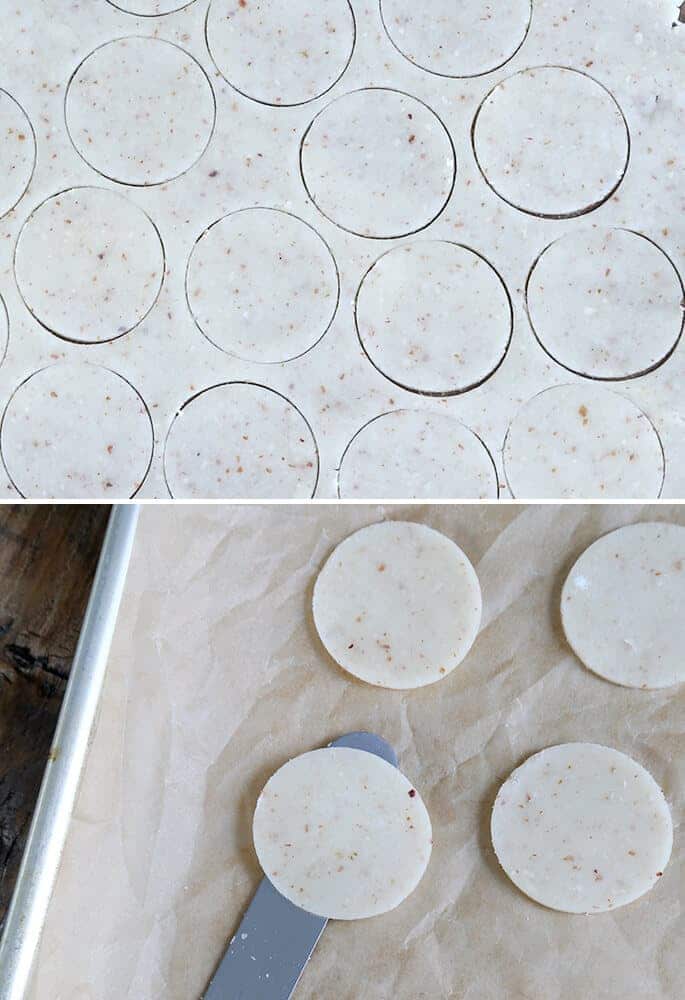 Raw crackers on beige paper 