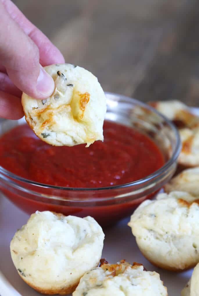 These soft, flavorful gluten free pizza bites are ready for the oven in minutes. Add some pepperoni, or switch up the spices to suit your tastes. Make them your own!