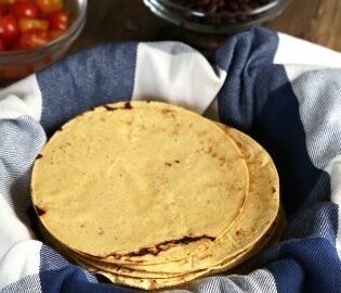 A beer commercial says don't flip tortillas with your fingers. Wrong.